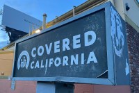 A photo of a sign advertising Covered California, the state's Affordable Care Act marketplace, in Los Angeles.