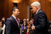 A photo of Marty Makary in a Senate hearing room speaking to Sen. Bill Cassidy.