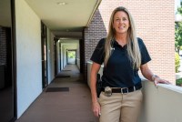 A photo of a police sergeant standing outside.
